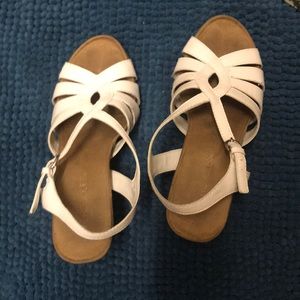 Lightly used pair of Aerosoles white sandal wedges